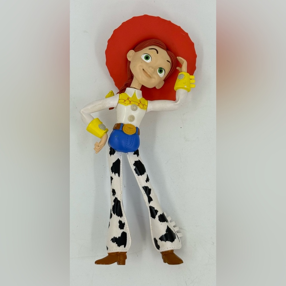 Disney Jessie Cowgirl Action Figure with Red Hat, Blue Belt & Yellow Accents